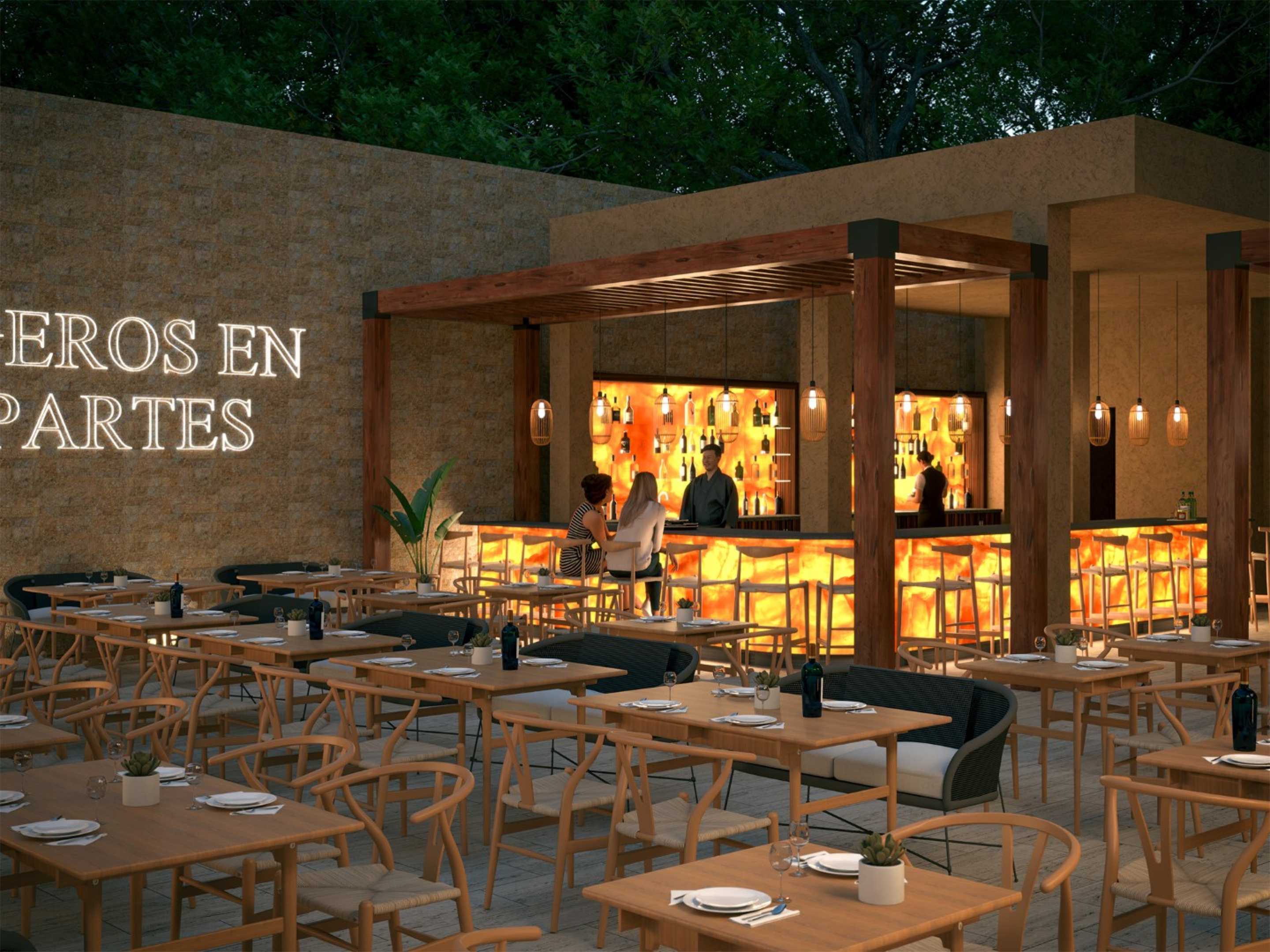 An outdoor restaurant courtyard with wooden tables and chairs arranged around a glowing backlit bar under a wood pergola. Warm pendant lights illuminate the seating area against stone walls and surrounding greenery.