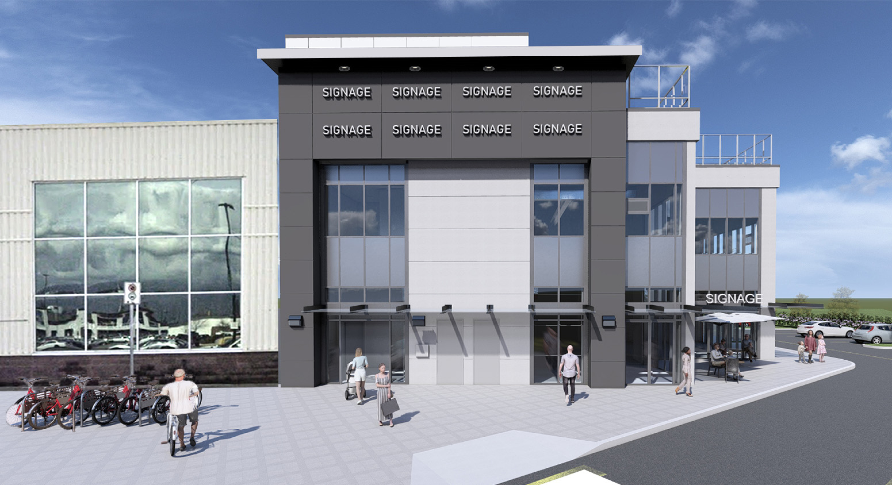 A rendered view of a modern three‑storey commercial building with large glass windows and dark exterior panels. Blank storefront signage, outdoor seating, bicycles, and pedestrians appear along a wide paved plaza.
